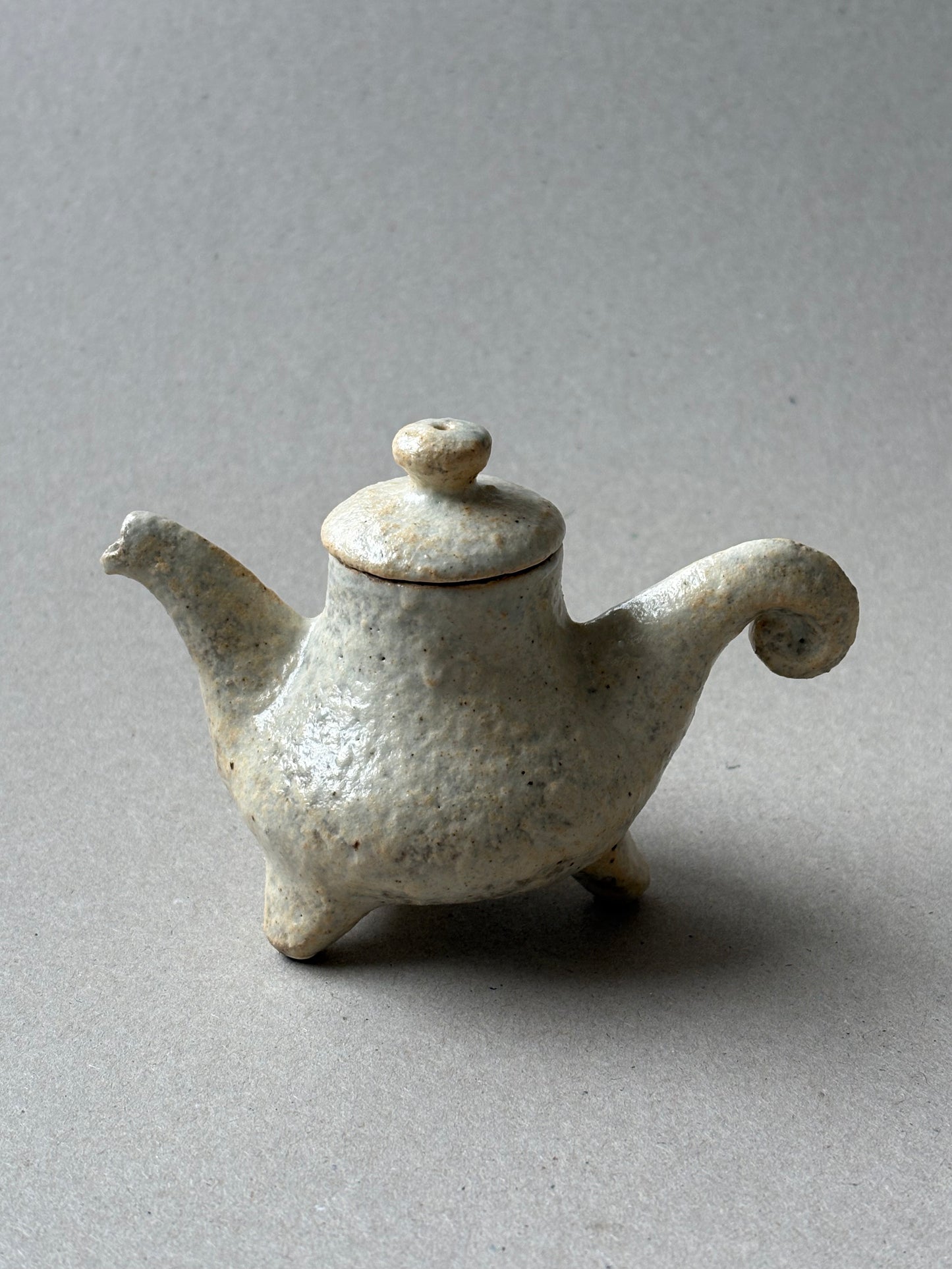Three legged tea pot