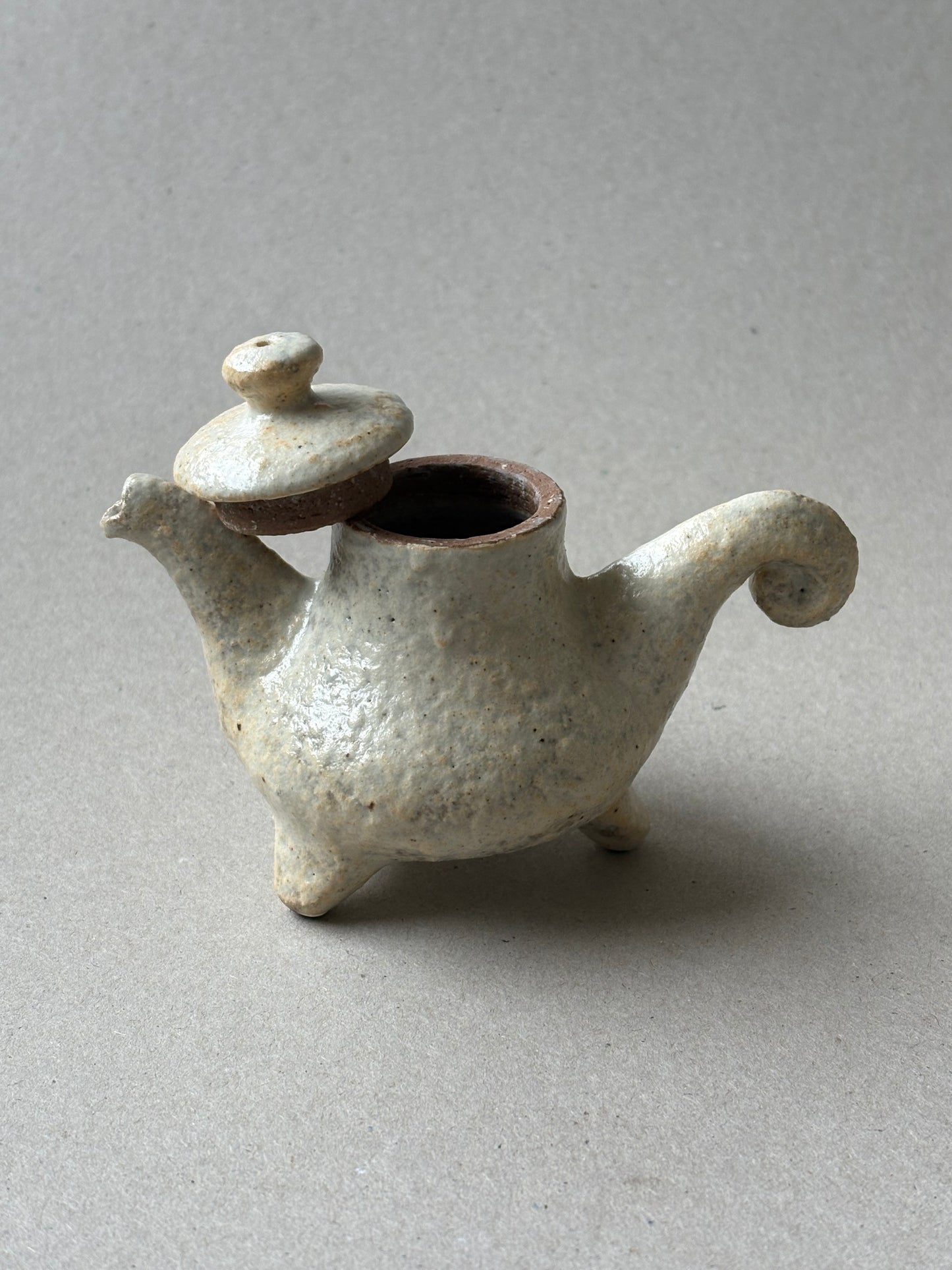Three legged tea pot
