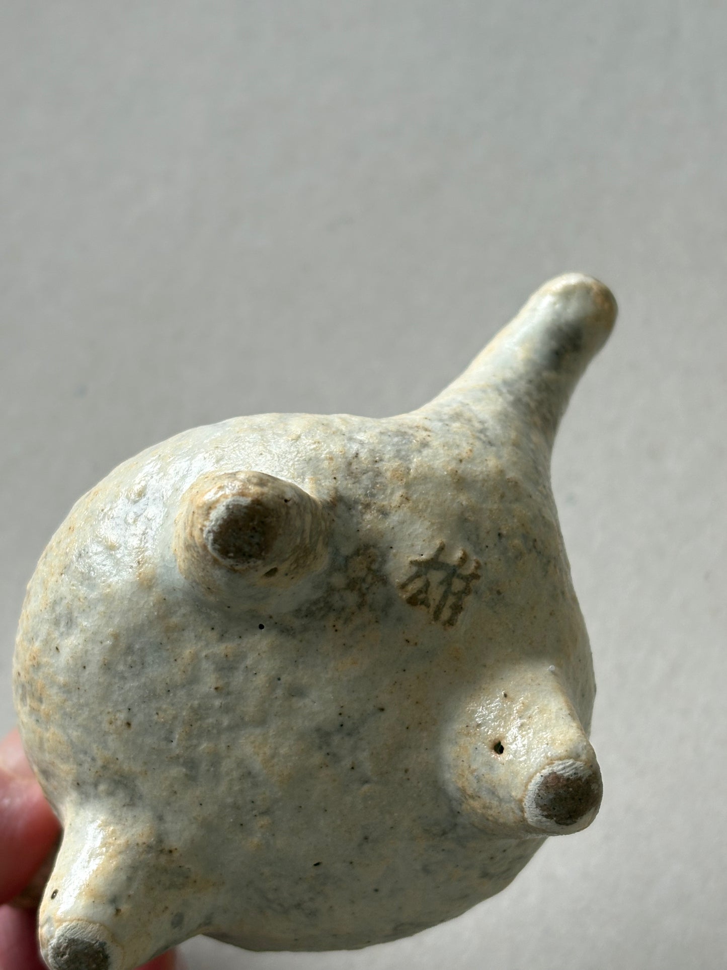 Three legged tea pot