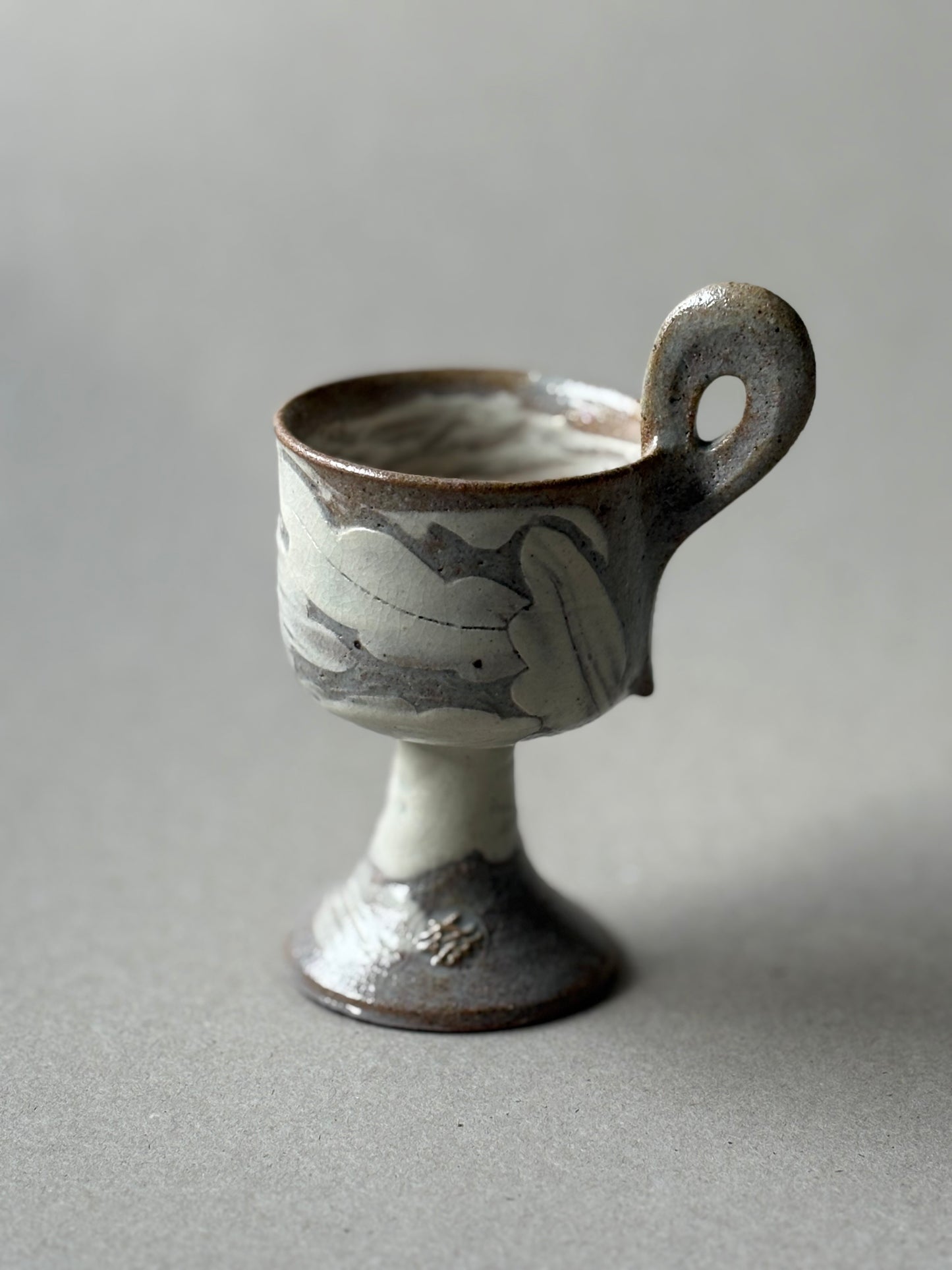 Guiyal Buncheong stem tea cup with a loop handle