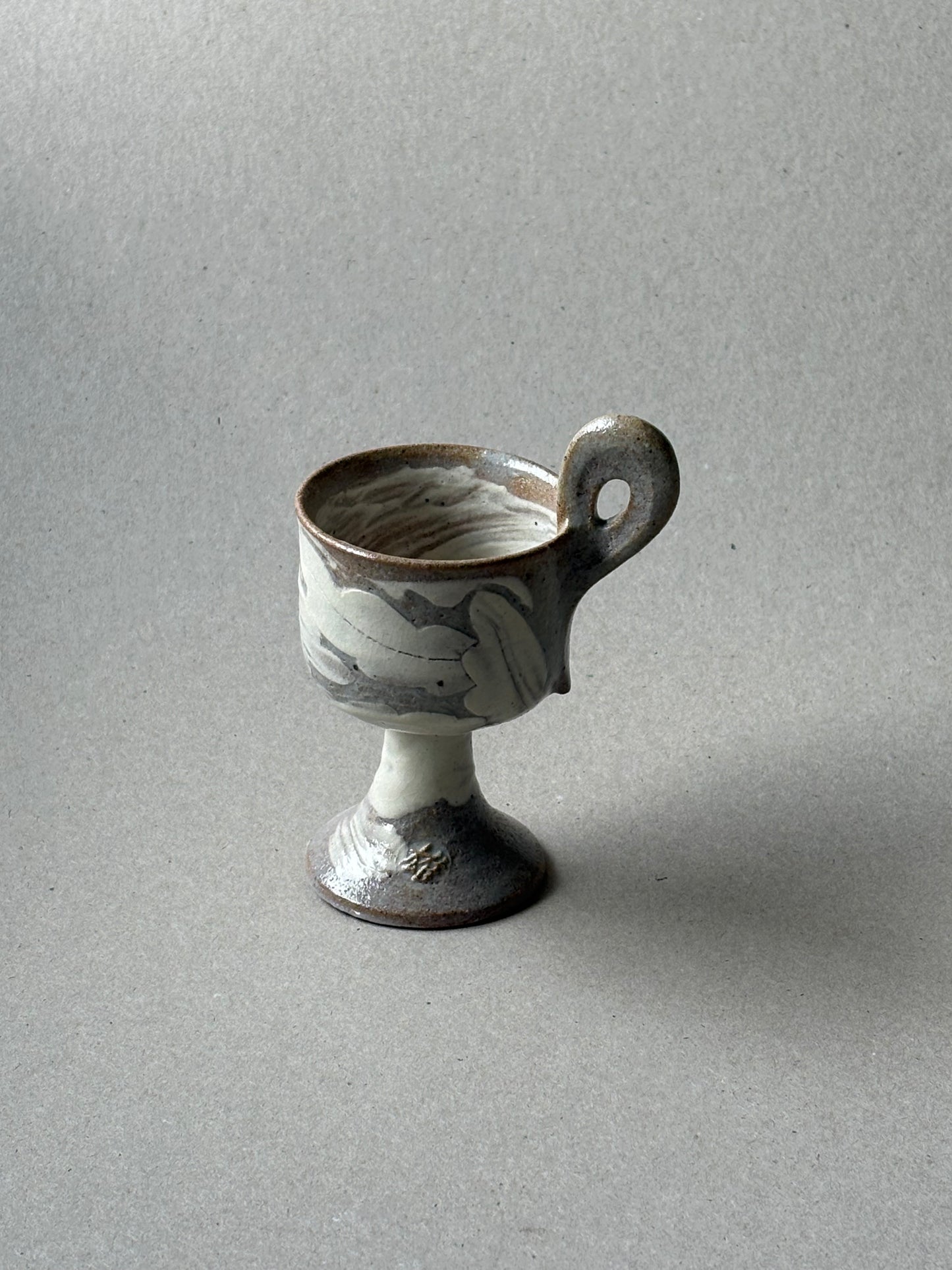 Guiyal Buncheong stem tea cup with a loop handle