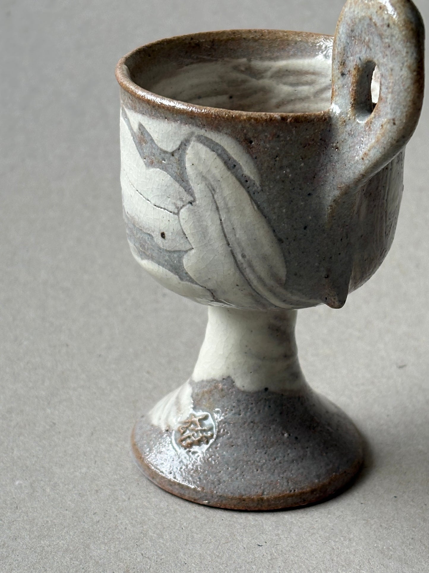 Guiyal Buncheong stem tea cup with a loop handle