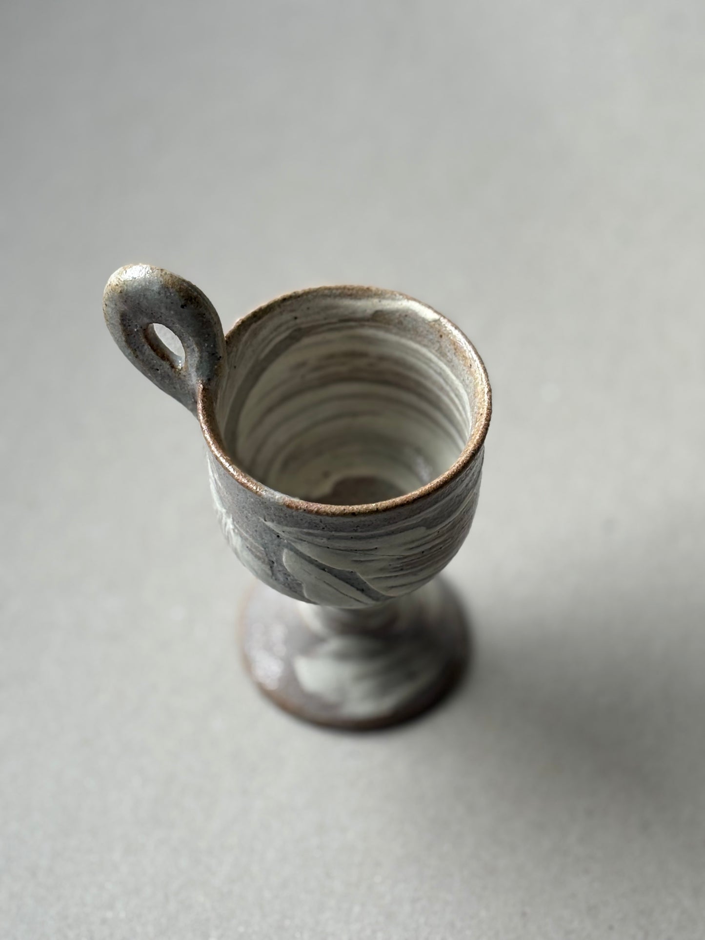 Guiyal Buncheong stem tea cup with a loop handle